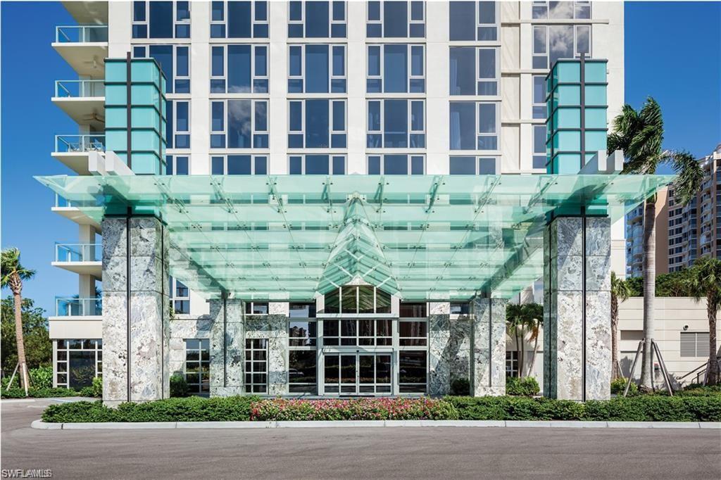 6897 Grenadier Boulevard, Unit 1701 Naples, FL 34108 - Photo 2 of 14 front view of a building