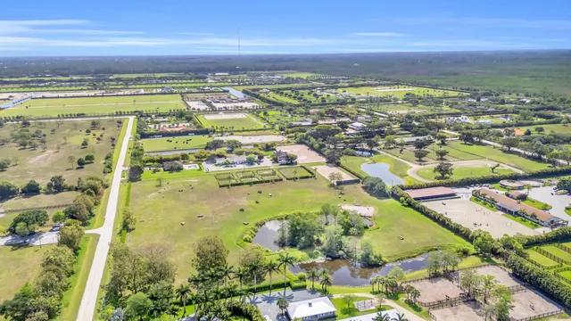 an aerial view of a house with a garden