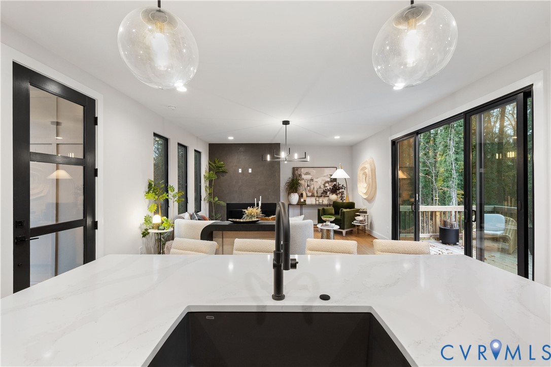 8632 Cherokee Road Richmond, VA 23235 - Photo 14 of 34 a view of a living room and chandelier