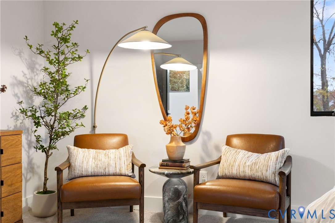 8632 Cherokee Road Richmond, VA 23235 - Photo 19 of 34 a living room with furniture and a potted plant