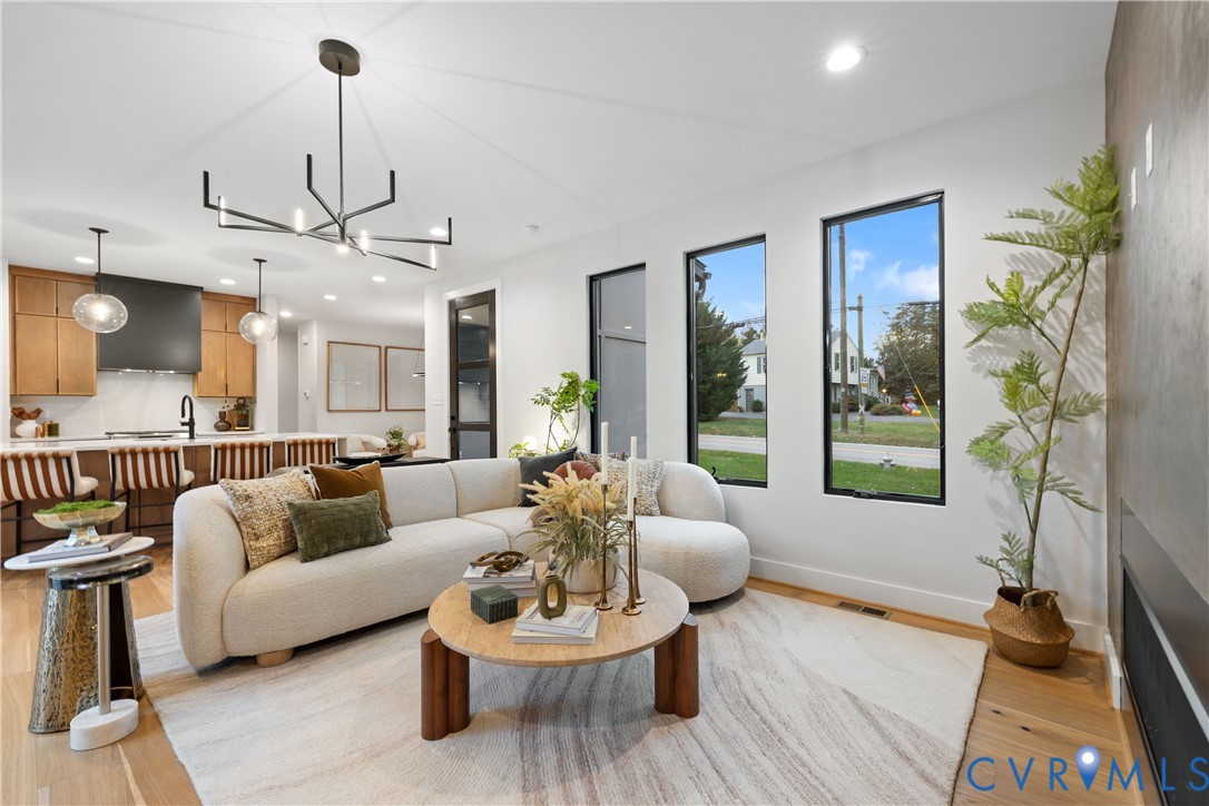 8632 Cherokee Road Richmond, VA 23235 - Photo 2 of 34 a living room with furniture and a large window
