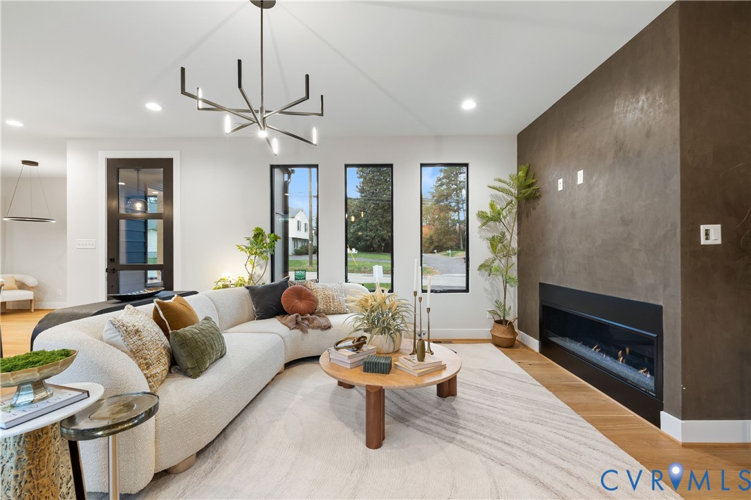 8632 Cherokee Road Richmond, VA 23235 - Photo 3 of 34 a living room with furniture and a large window