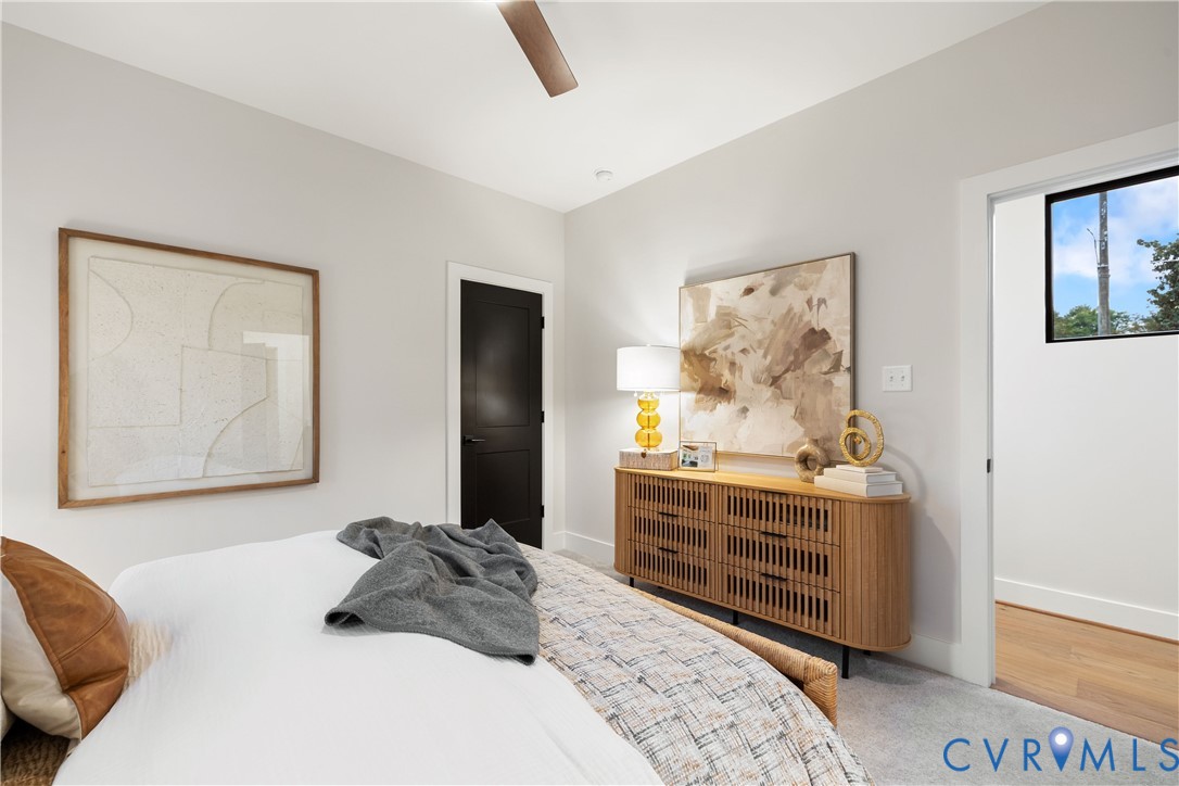 8632 Cherokee Road Richmond, VA 23235 - Photo 31 of 34 a bedroom with a bed and a dresser in it