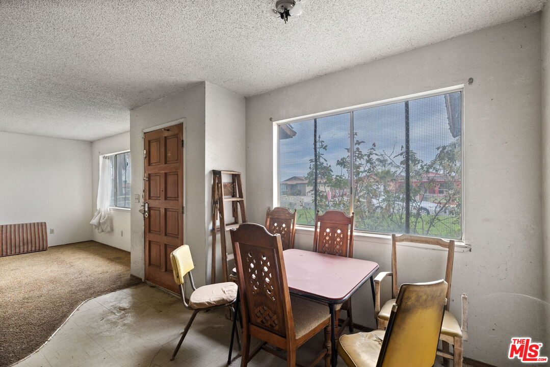 1112 Valencia Avenue Delano, CA 93215 - Photo 17 of 55 a dining room with furniture and window