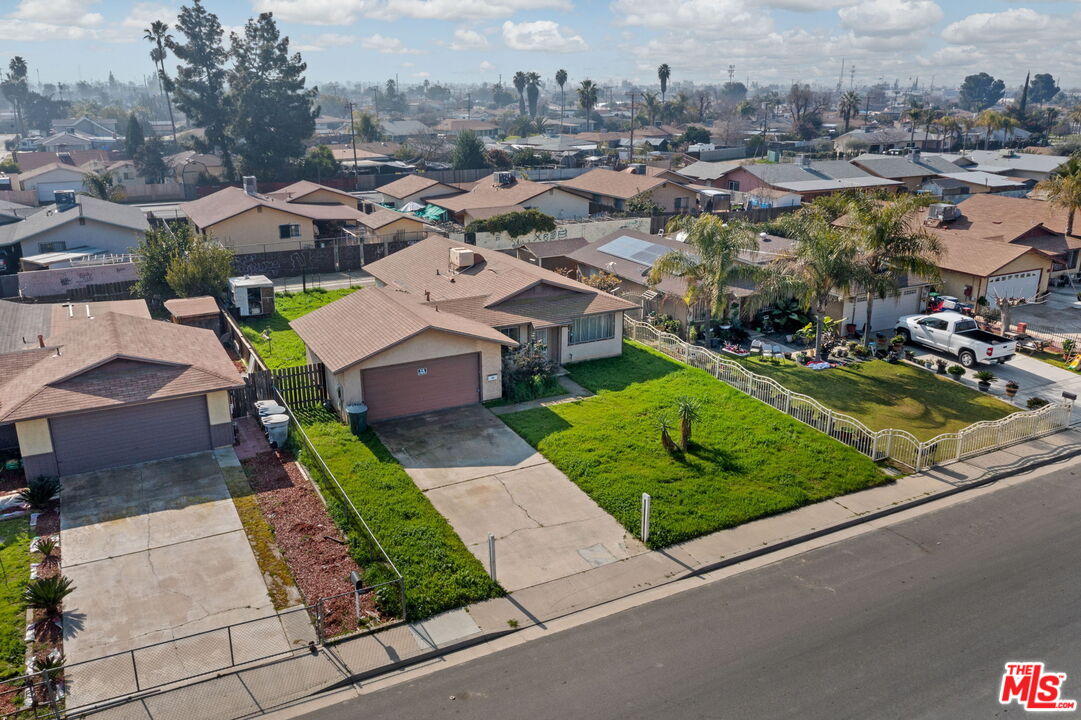 1112 Valencia Avenue Delano, CA 93215 - Photo 2 of 55 an aerial view of a house with garden