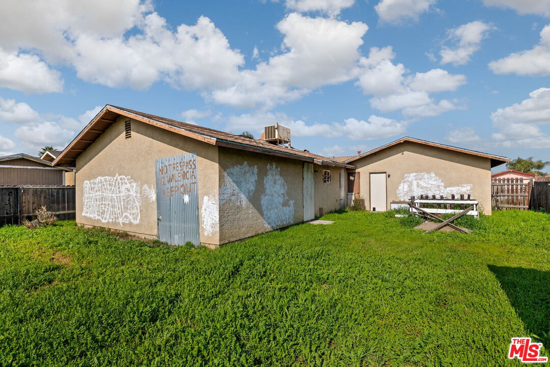 1112 Valencia Avenue Delano, CA 93215 - Photo 37 of 55 a view of a house with a yard
