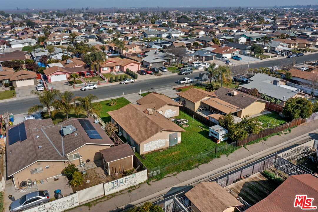 1112 Valencia Avenue Delano, CA 93215 - Photo 46 of 55 an aerial view of a house with a garden