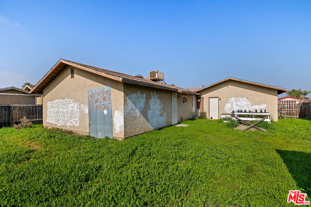 1112 Valencia Avenue Delano, CA 93215 - Photo 54 of 55 a view of a house with backyard