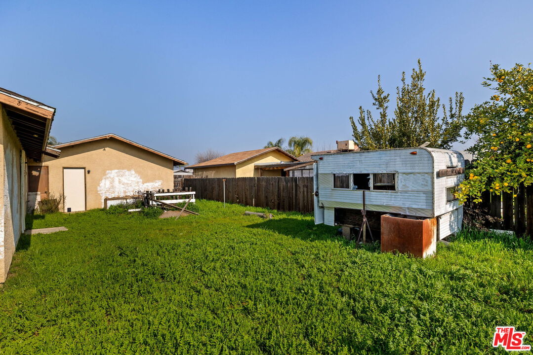 1112 Valencia Avenue Delano, CA 93215 - Photo 55 of 55 a backyard of a house with table and chairs