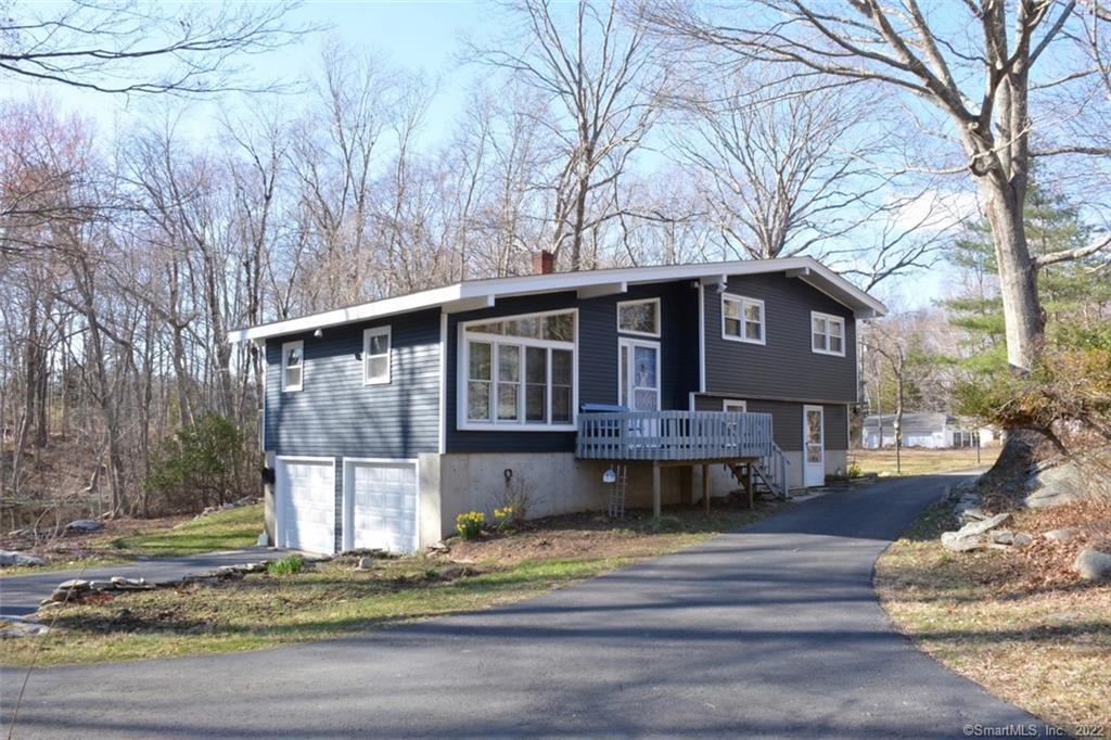 21 Carter Hill Road Clinton, CT 06413 - Photo 1 of 1 a front view of a house with a yard