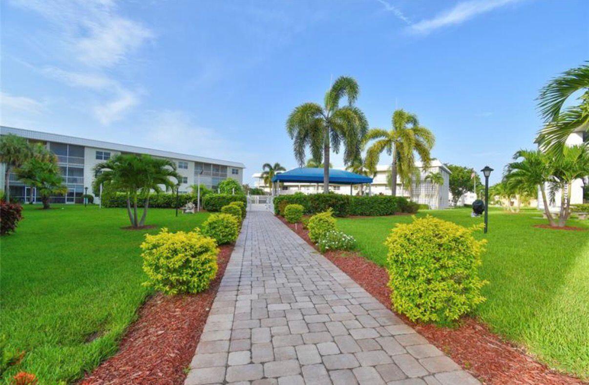 9880 Marina Boulevard, Unit 1520 Boca Raton, FL 33428 - Photo 30 of 36 Pool Entrance