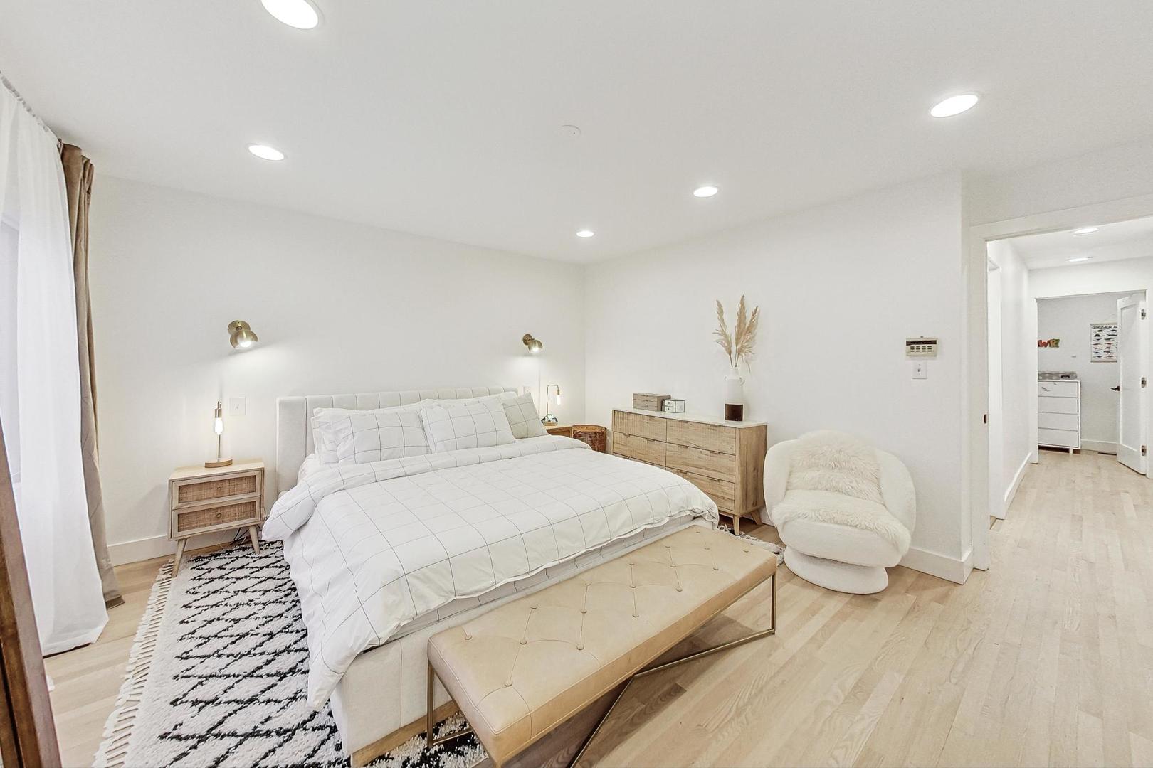 448 North Carpenter Street, Unit J Chicago, IL 60642 - Photo 17 of 39 a bedroom with a bed and a window