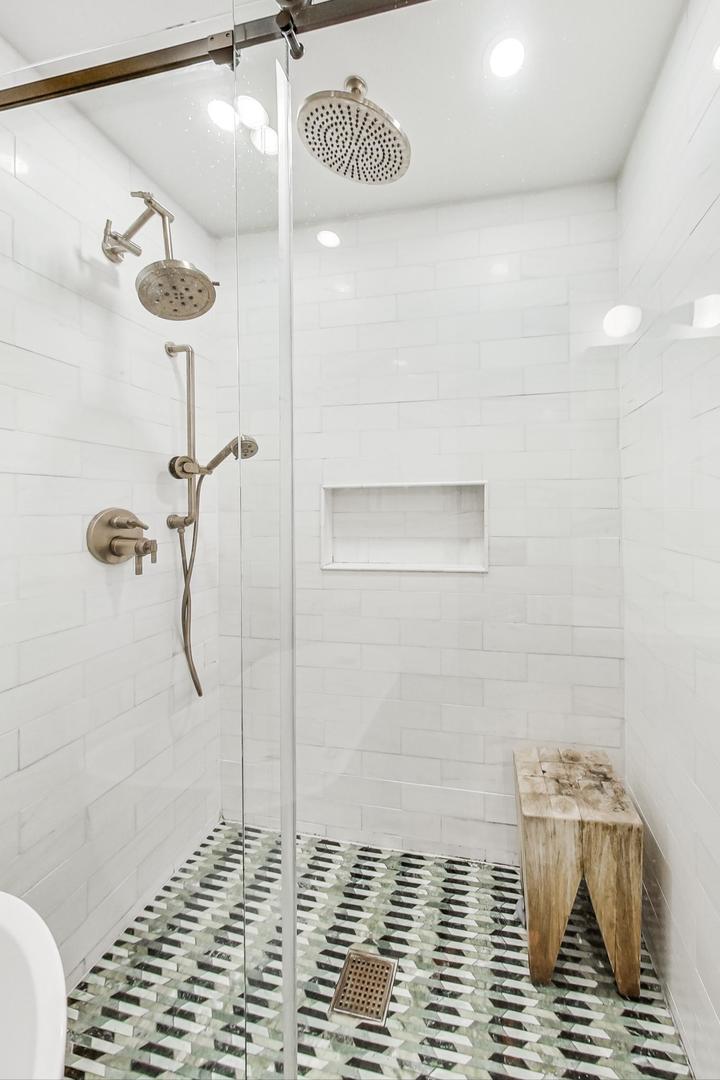 448 North Carpenter Street, Unit J Chicago, IL 60642 - Photo 20 of 39 a bathroom with a shower