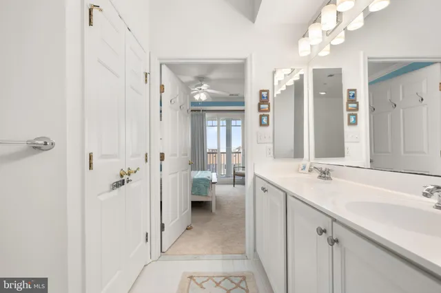 an aerial view of a house with a lake view