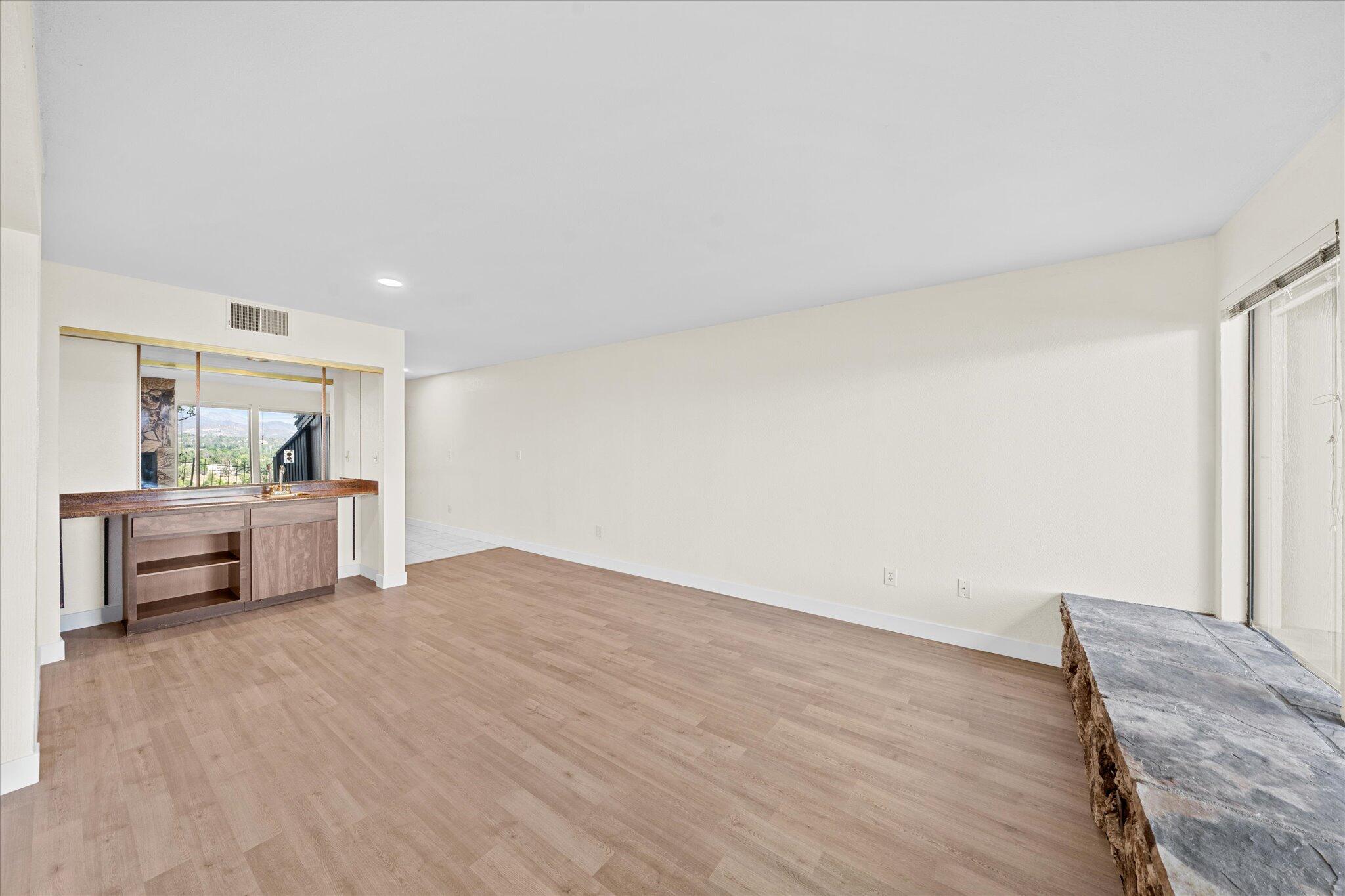 1954 Bechelli Lane Redding, CA 96002 - Photo 11 of 44 a view of kitchen with furniture and wooden floor