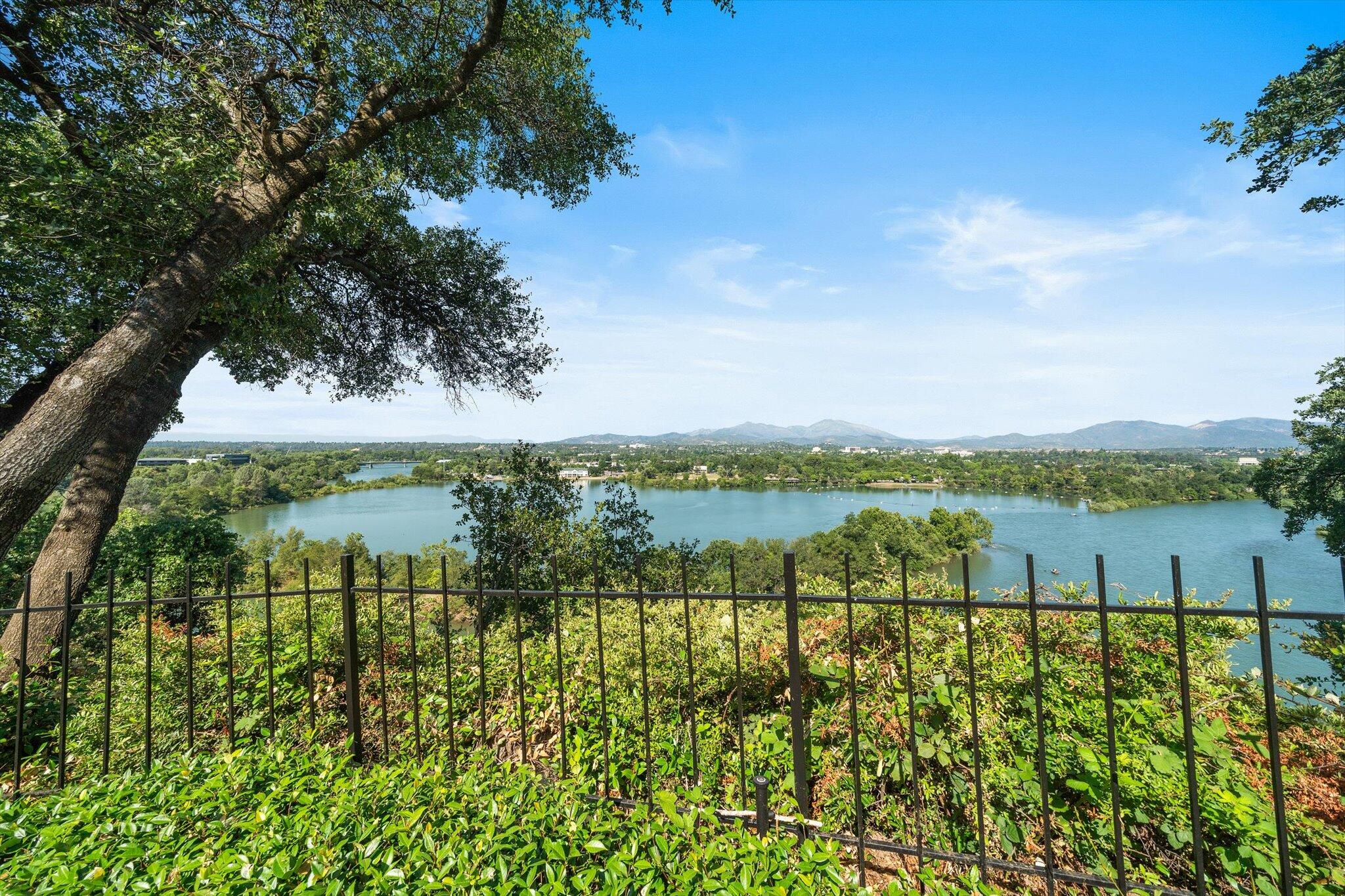 1954 Bechelli Lane Redding, CA 96002 - Photo 2 of 44 a view of lake with a large garden