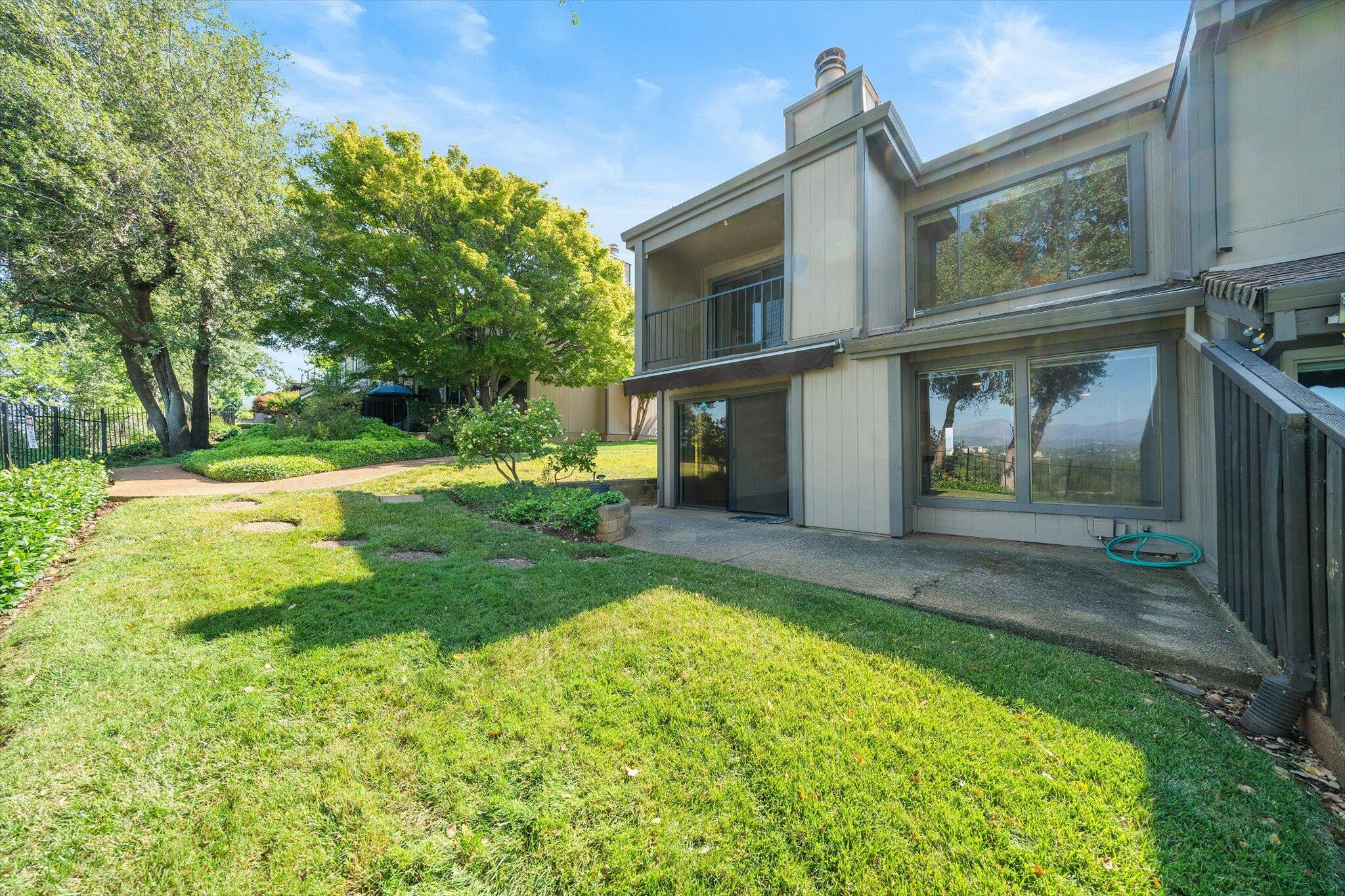 1954 Bechelli Lane Redding, CA 96002 - Photo 32 of 44 a view of a house with backyard and garden