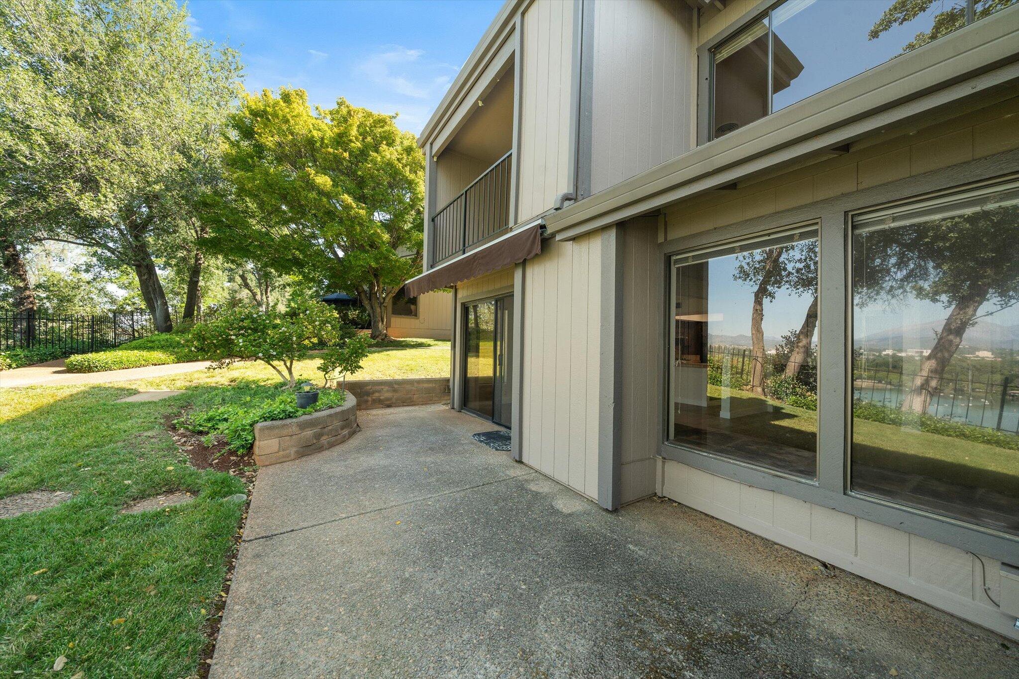 1954 Bechelli Lane Redding, CA 96002 - Photo 34 of 44 a view of a house with a yard and garage