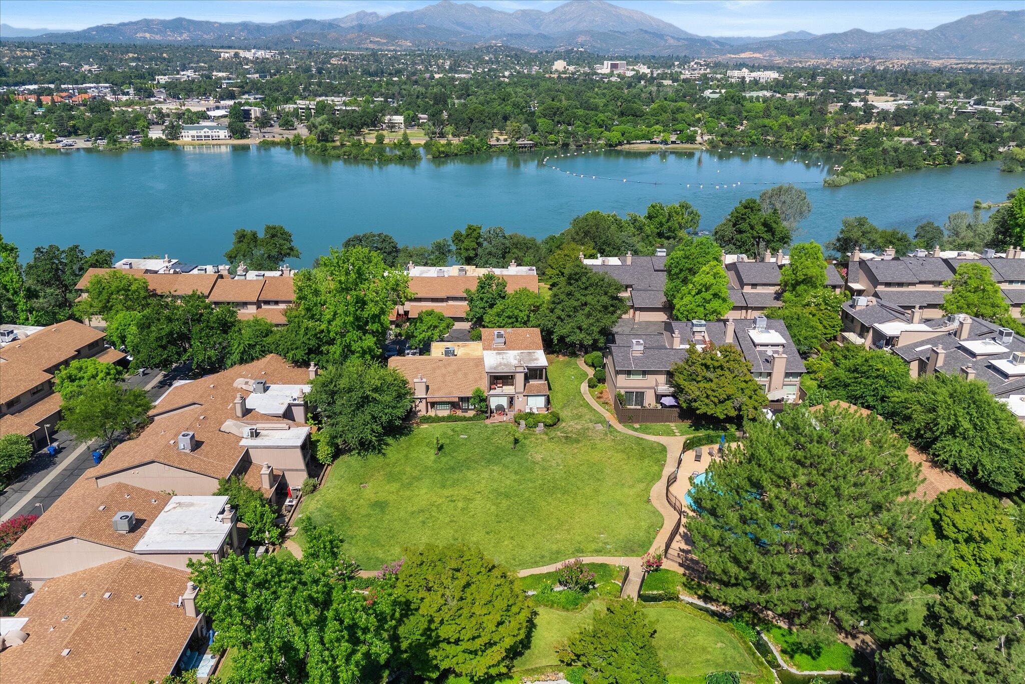 1954 Bechelli Lane Redding, CA 96002 - Photo 39 of 44 an aerial view of lake residential house with outdoor space and trees