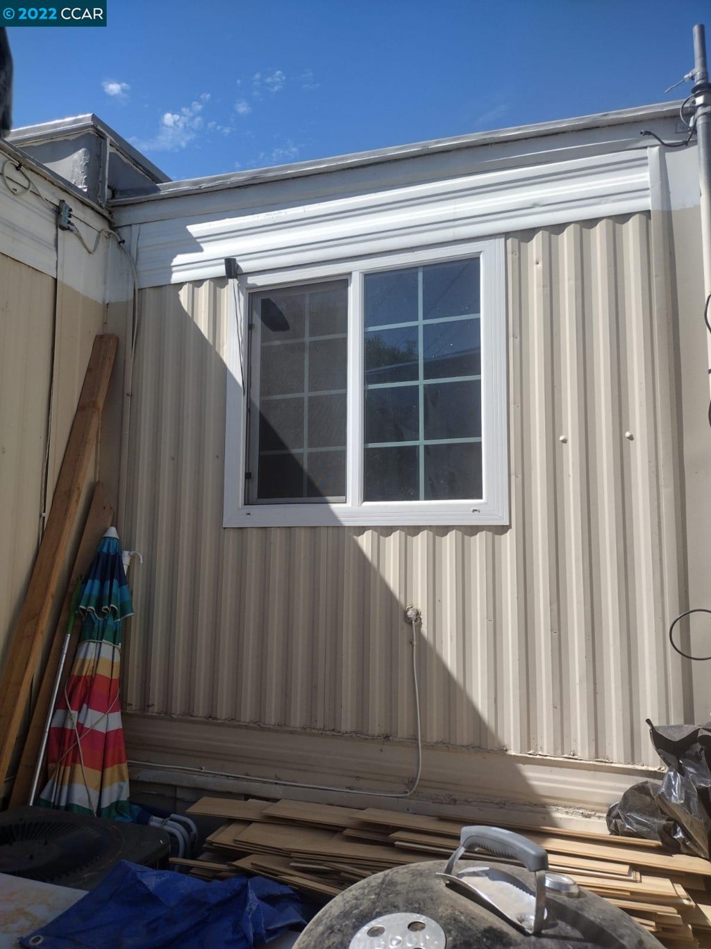 1027 Olive Drive Davis, CA 95616 - Photo 5 of 6 a view of room with a window and wooden floor