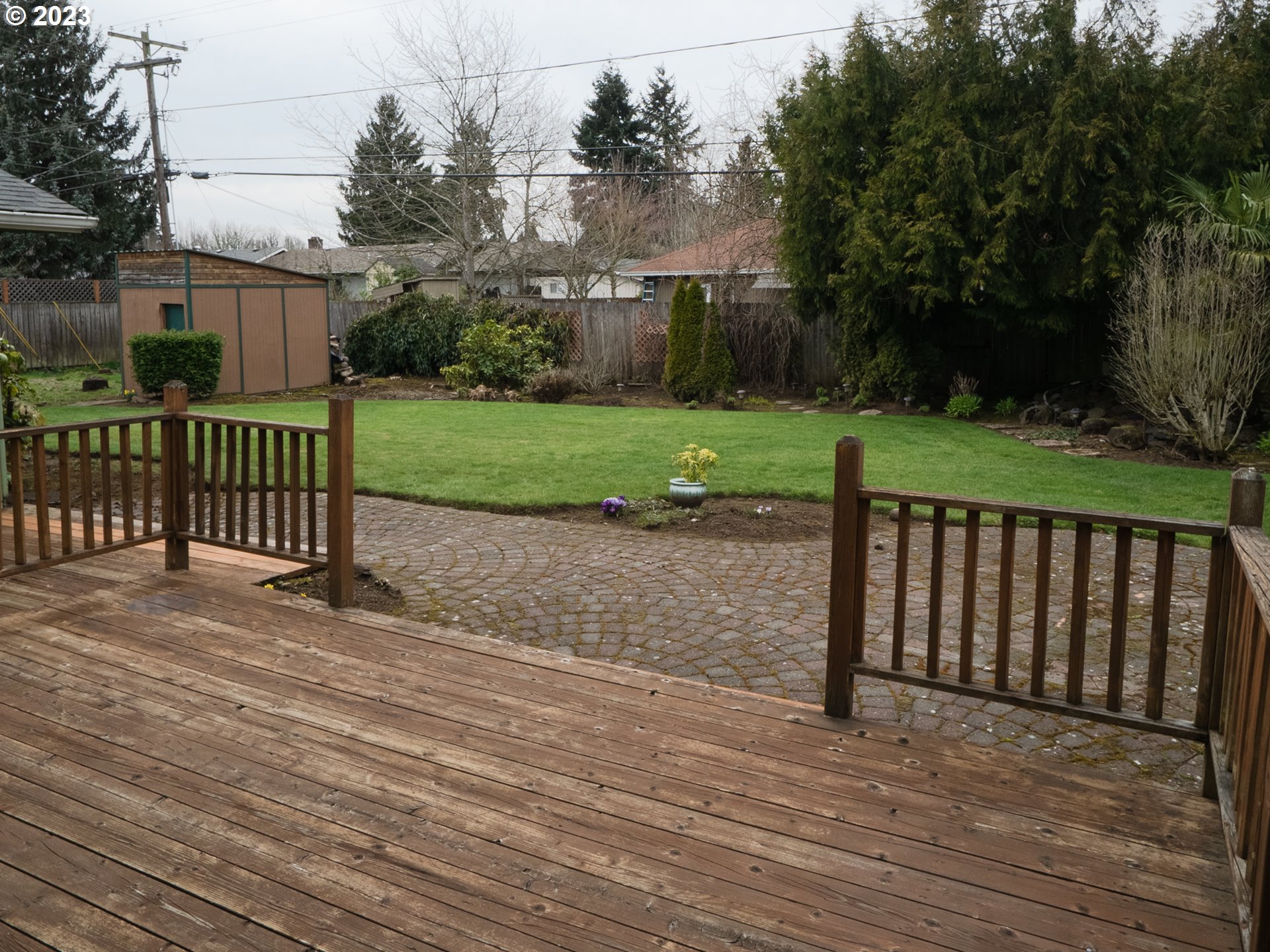 1124 President Street Eugene, OR 97401 - Photo 24 of 26 a view of a deck and yard with green space