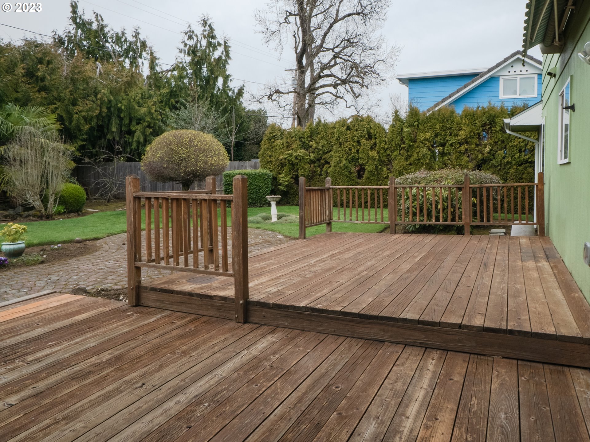 1124 President Street Eugene, OR 97401 - Photo 26 of 26 a view of deck with wooden floor and outdoor seating