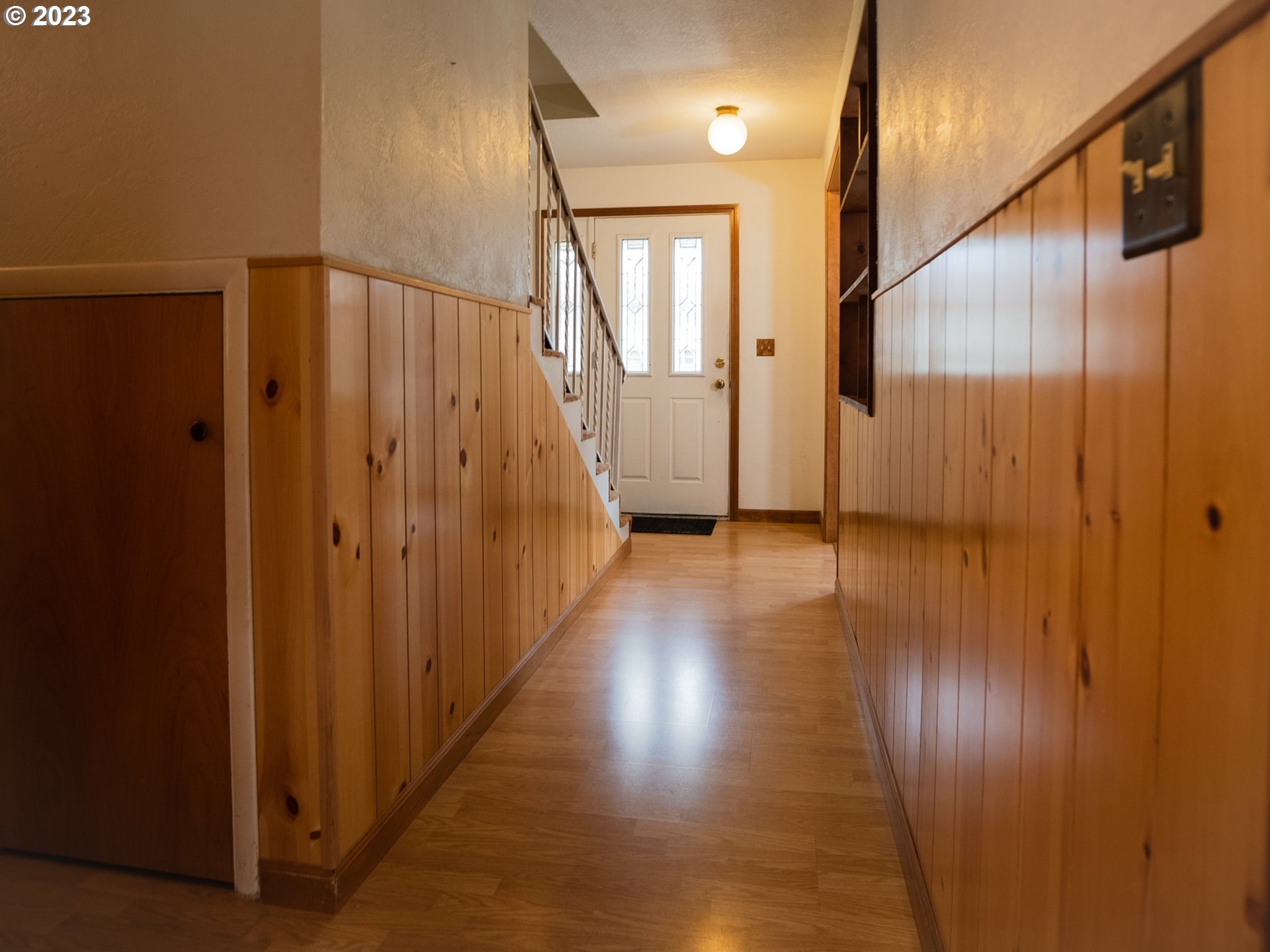 1124 President Street Eugene, OR 97401 - Photo 3 of 26 a view of a hallway with wooden floor