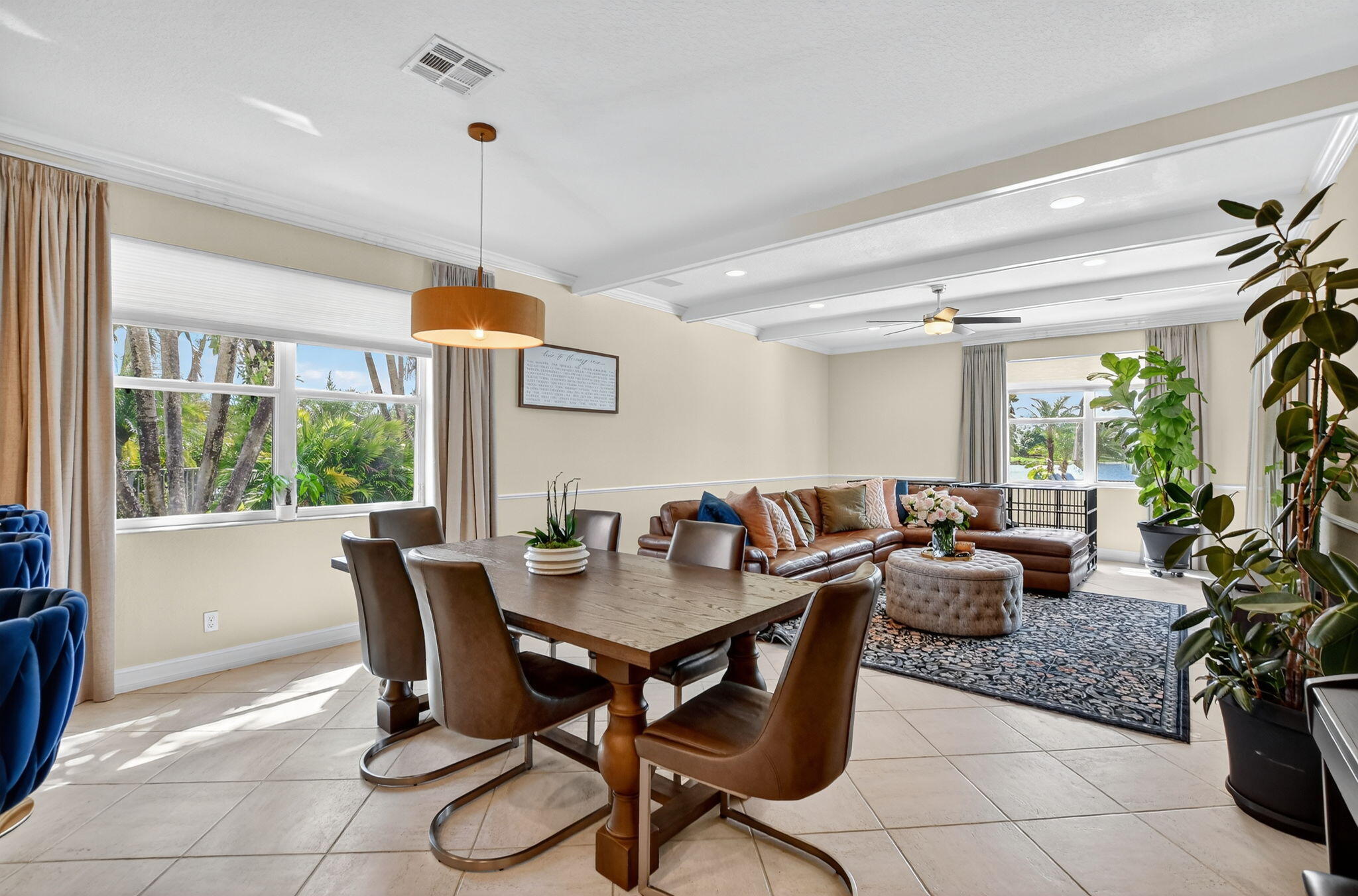 21383 Falls Ridge Way, Unit 1 Boca Raton, FL 33428 - Photo 11 of 44 a dining room with furniture a chandelier and window