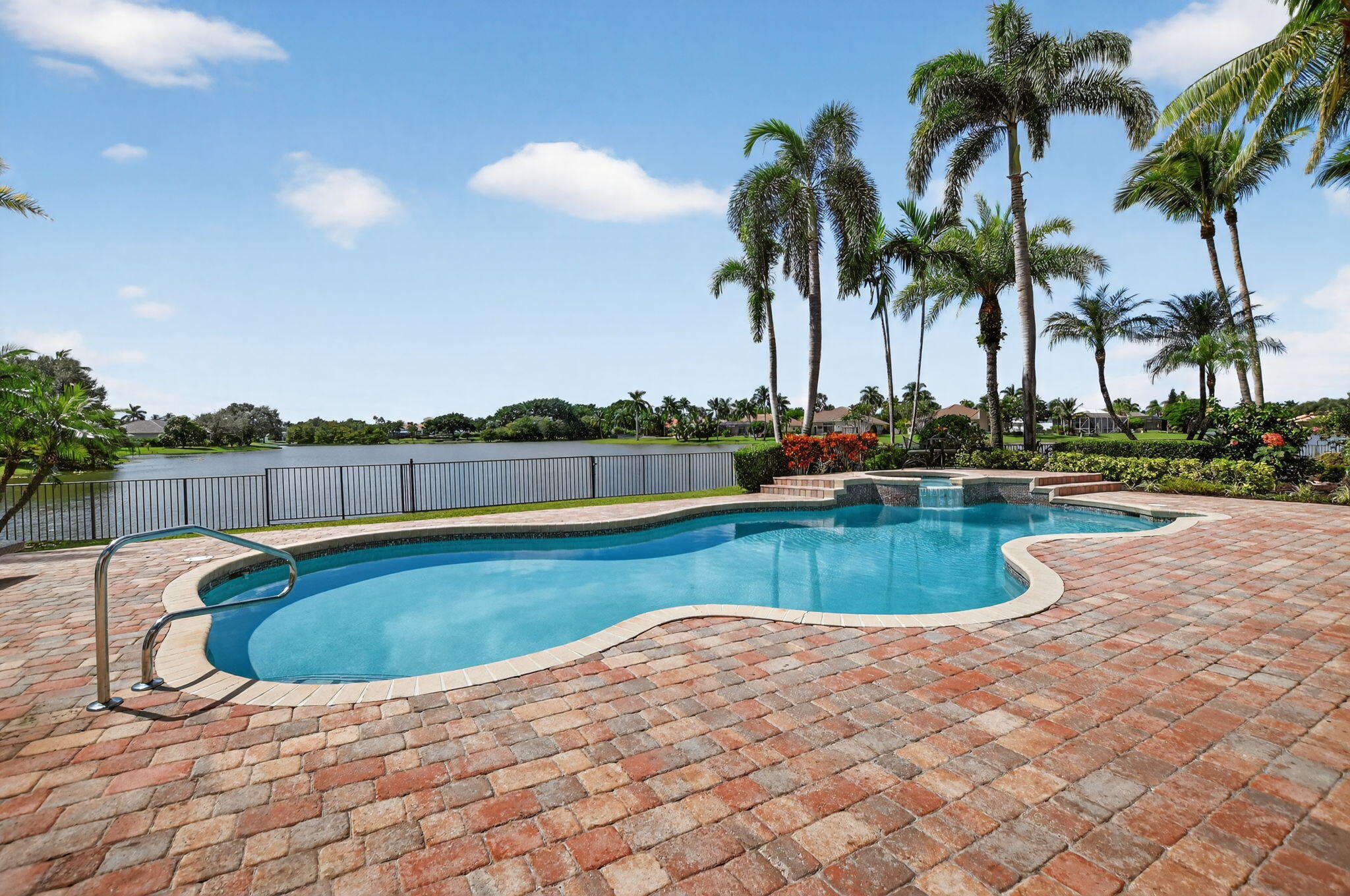 21383 Falls Ridge Way, Unit 1 Boca Raton, FL 33428 - Photo 36 of 44 a view of swimming pool with outdoor seating and plants