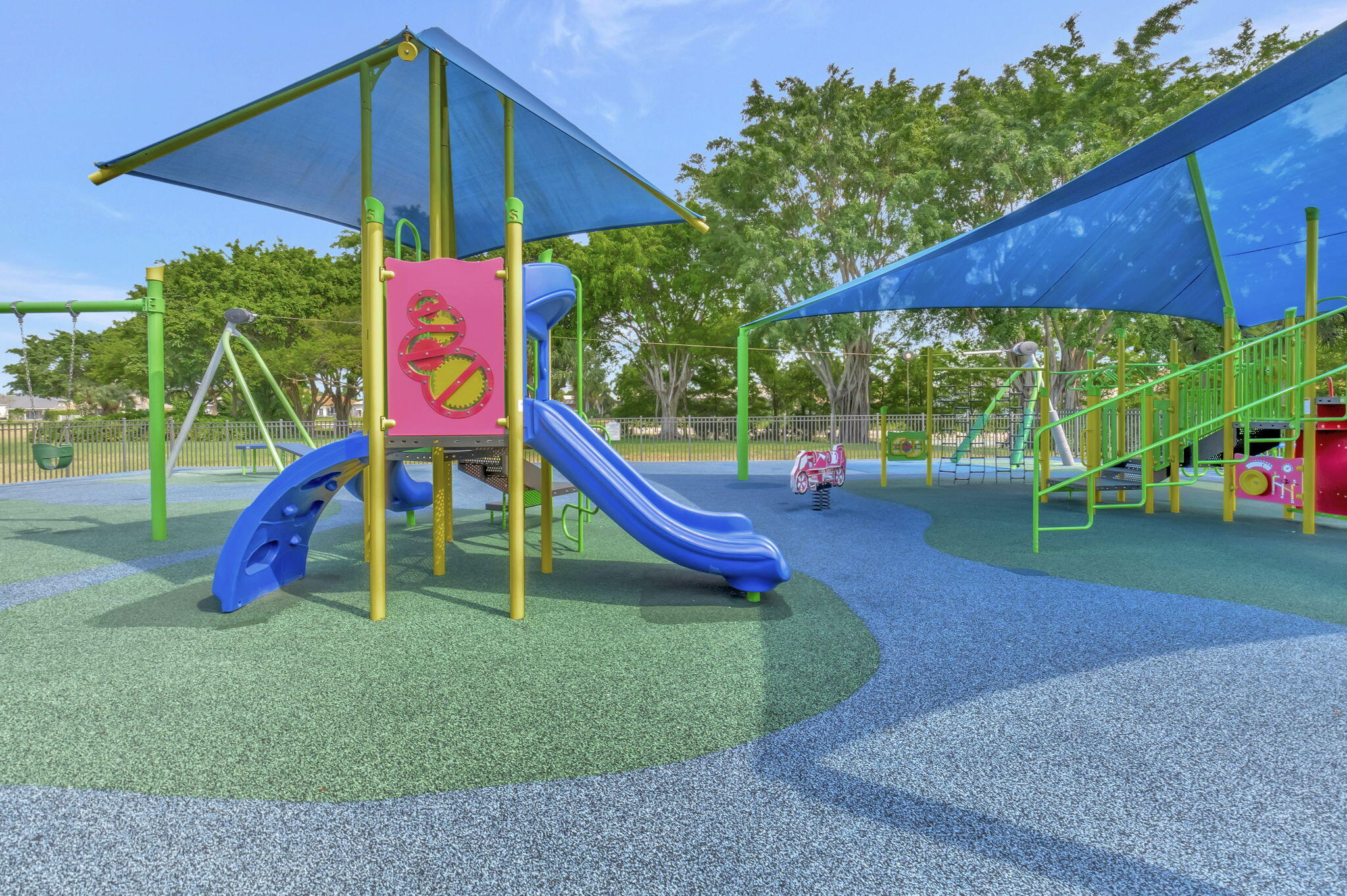 21383 Falls Ridge Way, Unit 1 Boca Raton, FL 33428 - Photo 42 of 44 a view of a park with slide