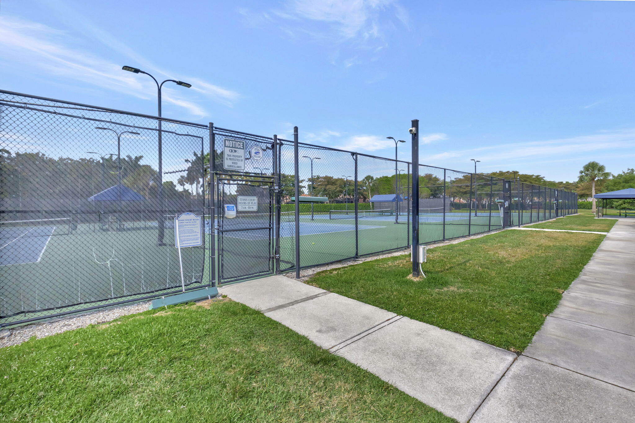 21383 Falls Ridge Way, Unit 1 Boca Raton, FL 33428 - Photo 43 of 44 a view of a backyard
