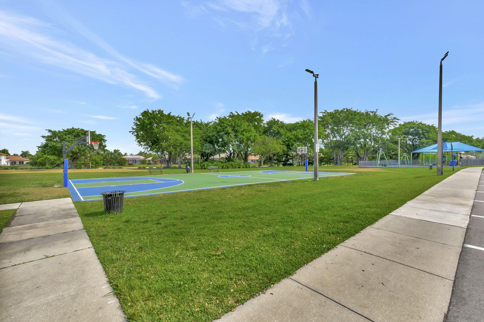 21383 Falls Ridge Way, Unit 1 Boca Raton, FL 33428 - Photo 44 of 44 a view of a park with large trees