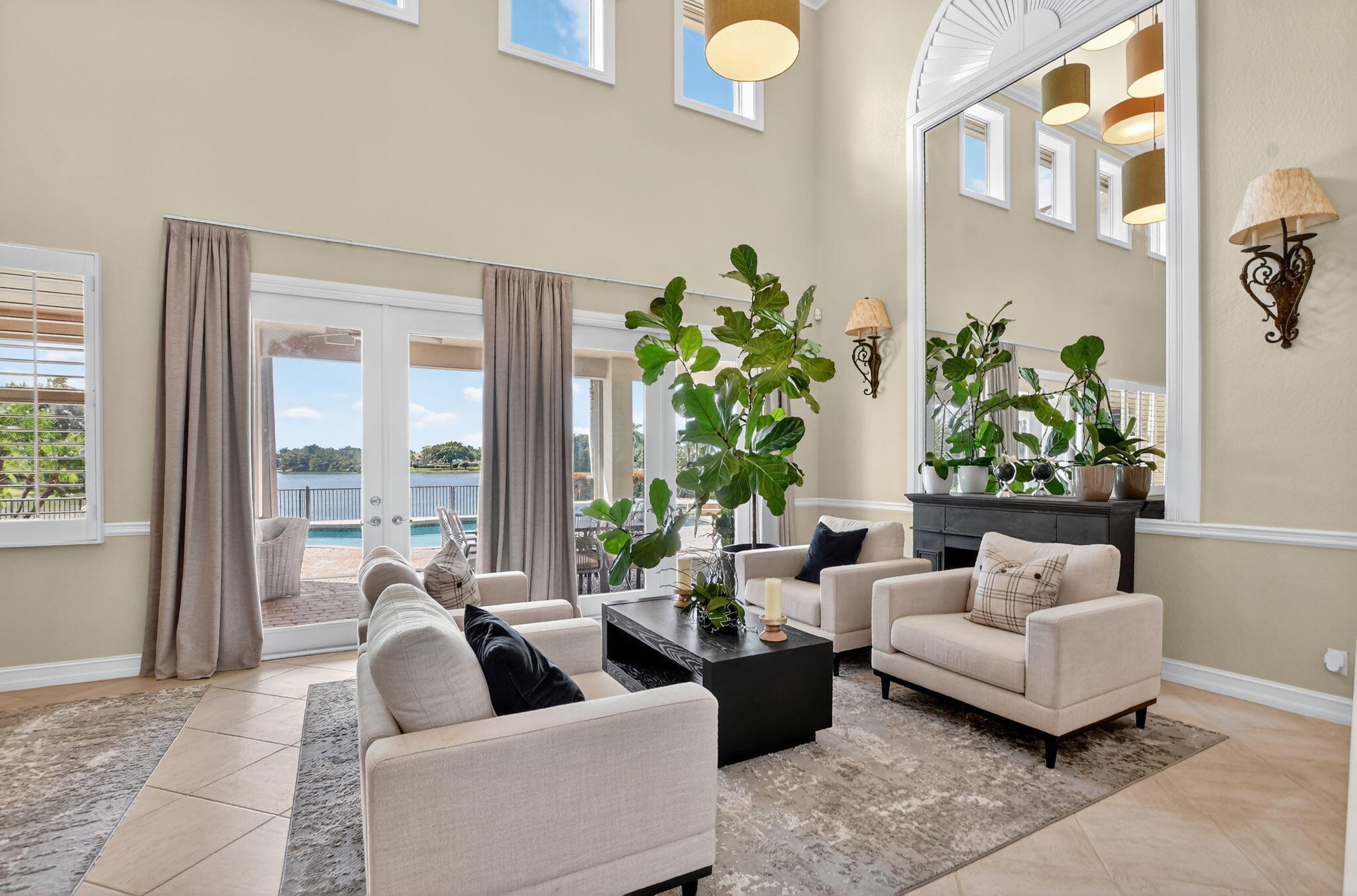 21383 Falls Ridge Way, Unit 1 Boca Raton, FL 33428 - Photo 7 of 44 a living room with furniture and a large window