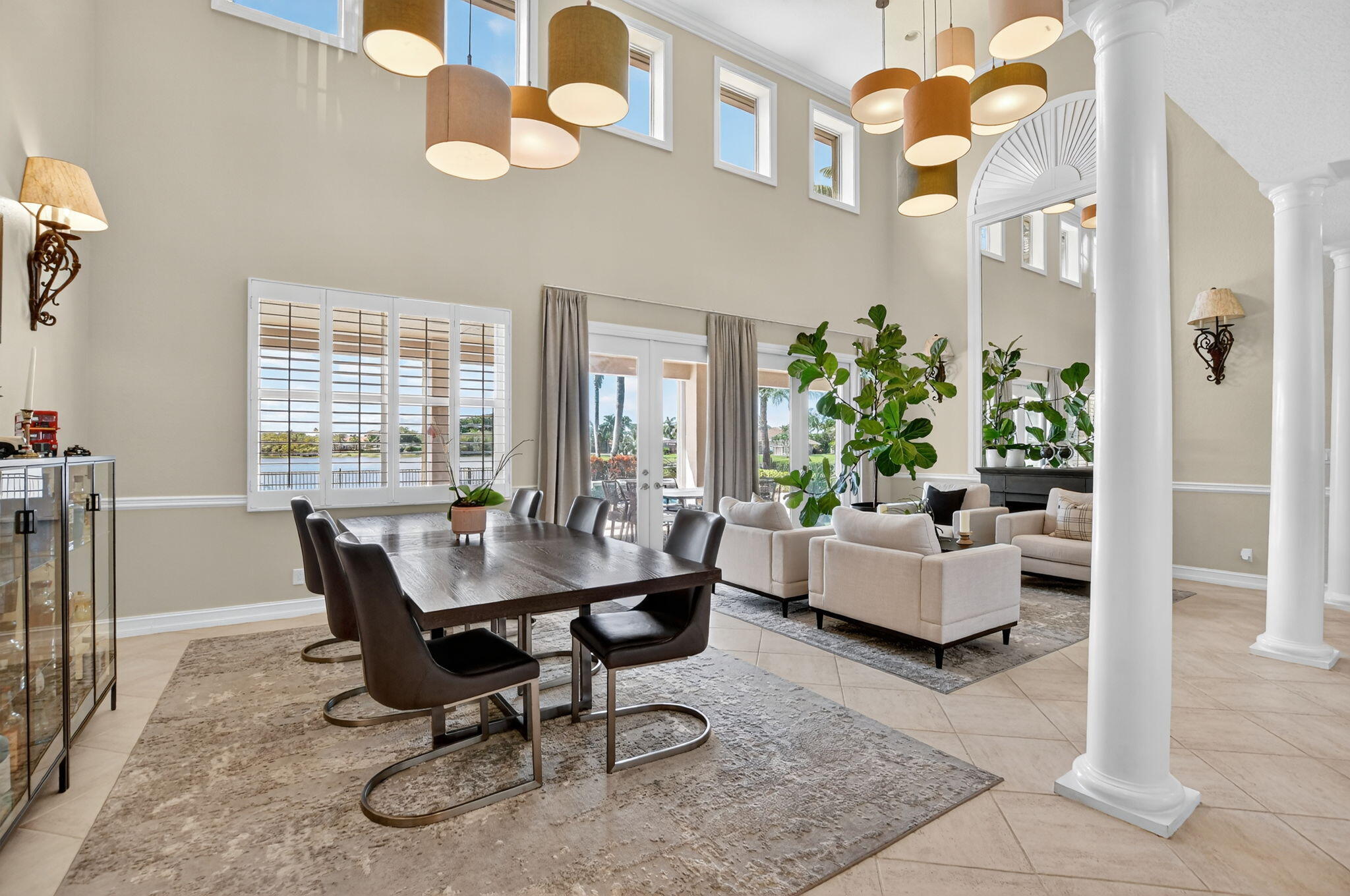 21383 Falls Ridge Way, Unit 1 Boca Raton, FL 33428 - Photo 9 of 44 a view of a livingroom with furniture and a potted plant