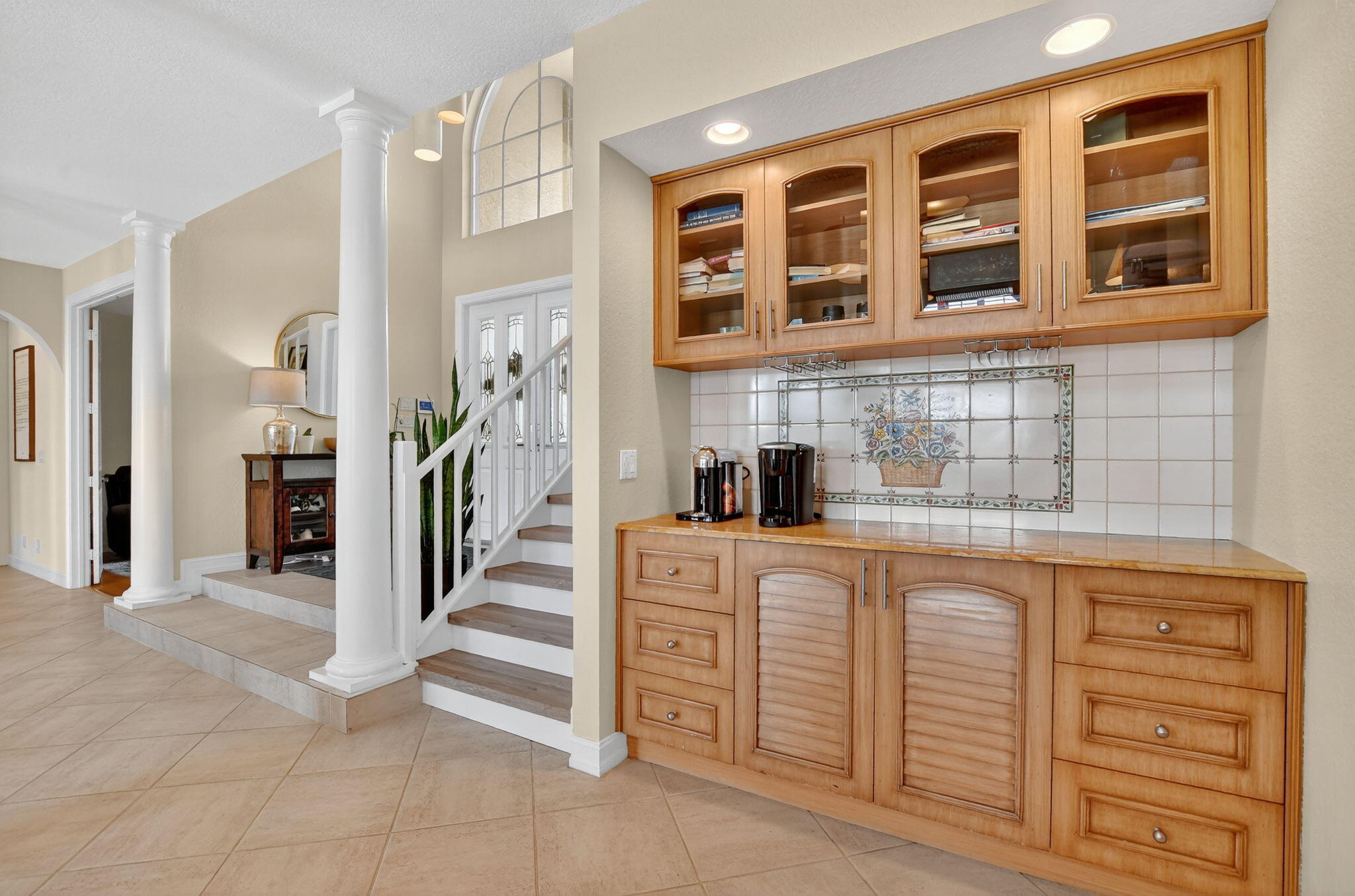 21383 Falls Ridge Way, Unit 1 Boca Raton, FL 33428 - Photo 10 of 44 a kitchen with stainless steel appliances granite countertop a refrigerator and a sink