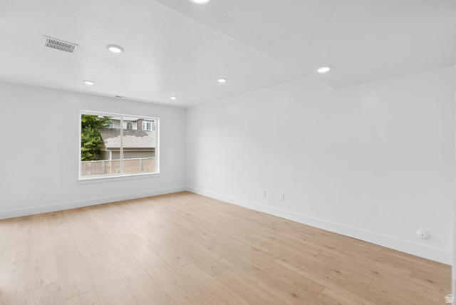 1617 North Angel Street Layton, UT 84041 - Photo 12 of 43 Unfurnished room featuring light wood finished floors and recessed lighting