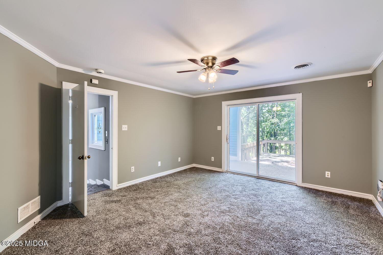 545 North Pine Hill Road Griffin, GA 30223 - Photo 15 of 39 a view of an empty room with a window