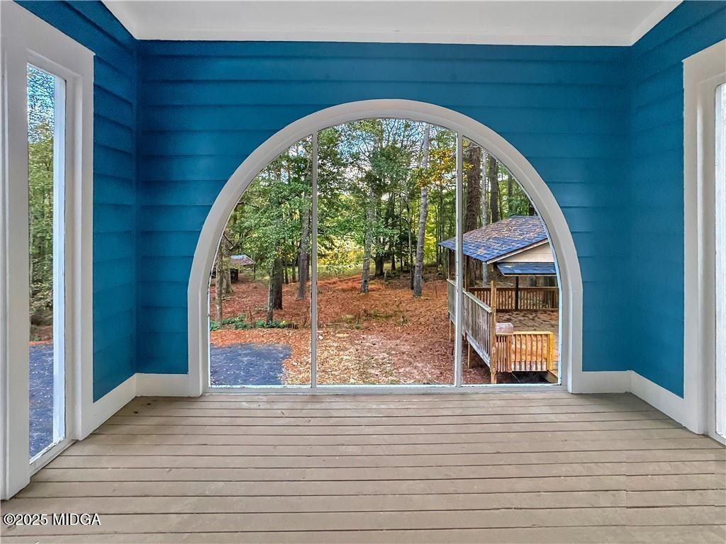 545 North Pine Hill Road Griffin, GA 30223 - Photo 27 of 39 a view of a livingroom with wooden floor and a large window