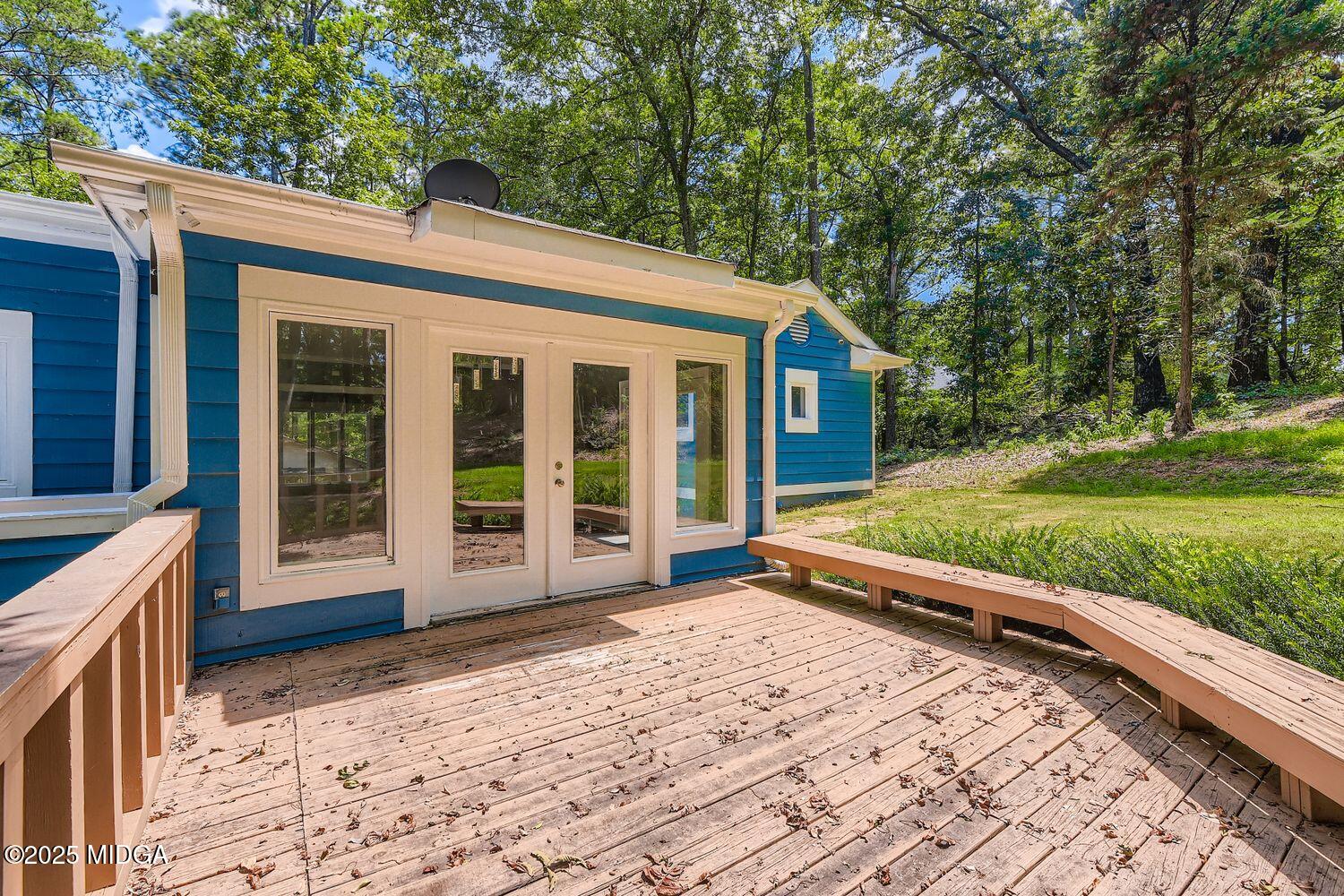 545 North Pine Hill Road Griffin, GA 30223 - Photo 32 of 39 a view of a house with a large window and yard