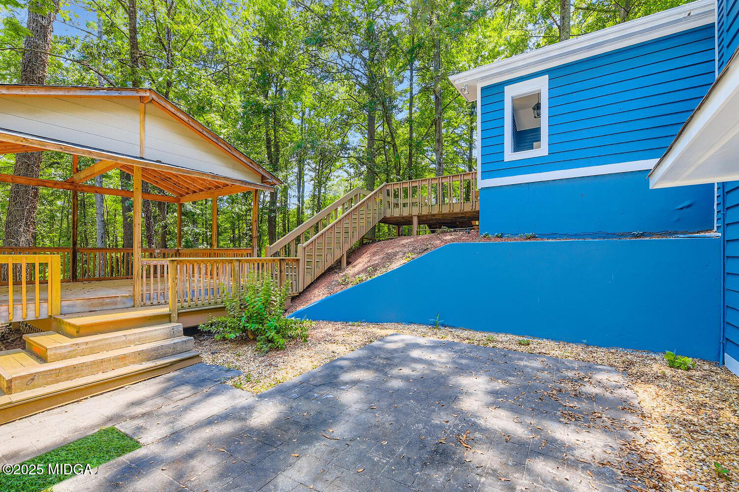 545 North Pine Hill Road Griffin, GA 30223 - Photo 35 of 39 a view of a house with backyard and wooden floor