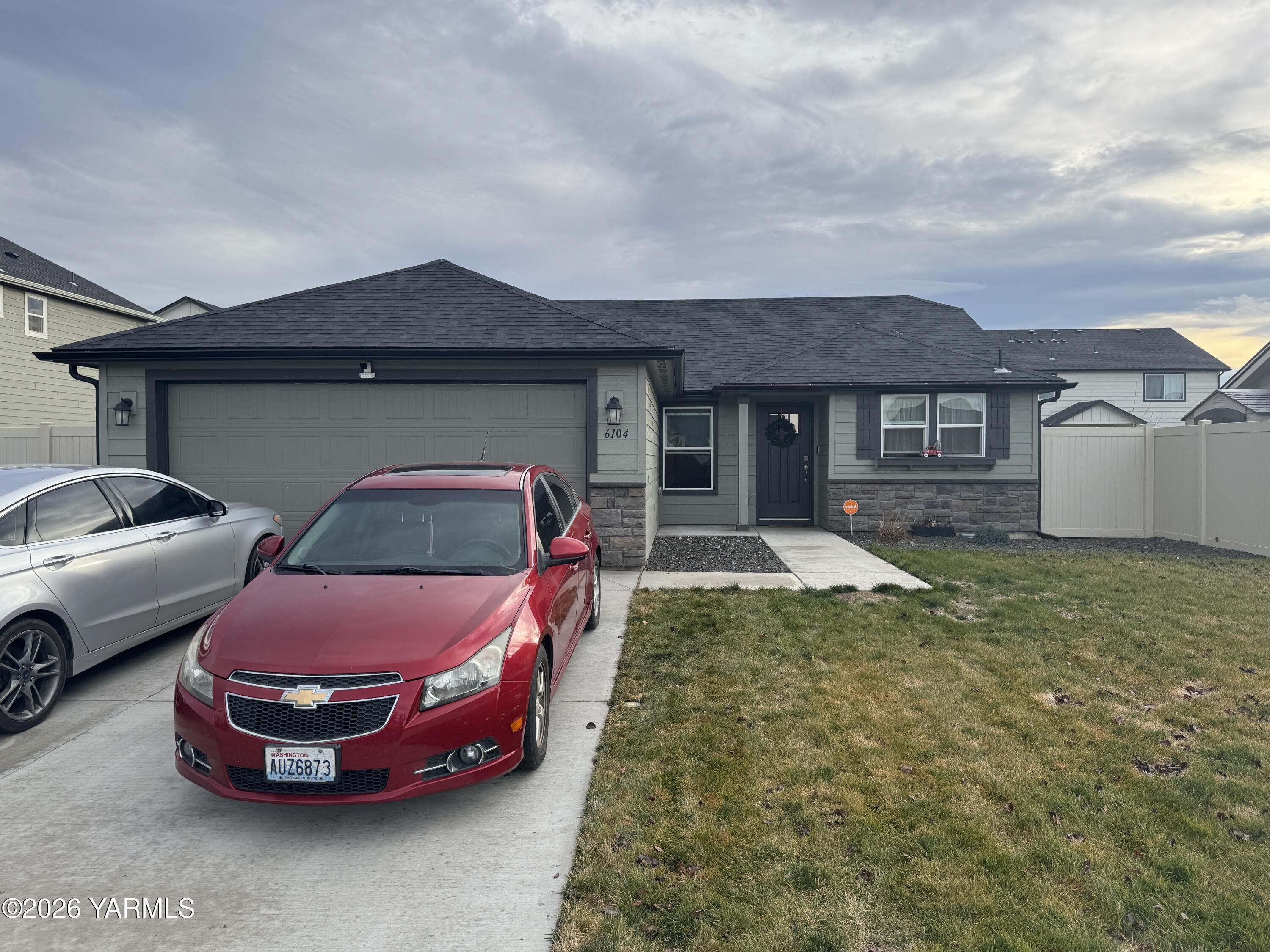 6104 Whitman Avenue Yakima, WA 98903 - Photo 2 of 19 a front view of a house with parking space