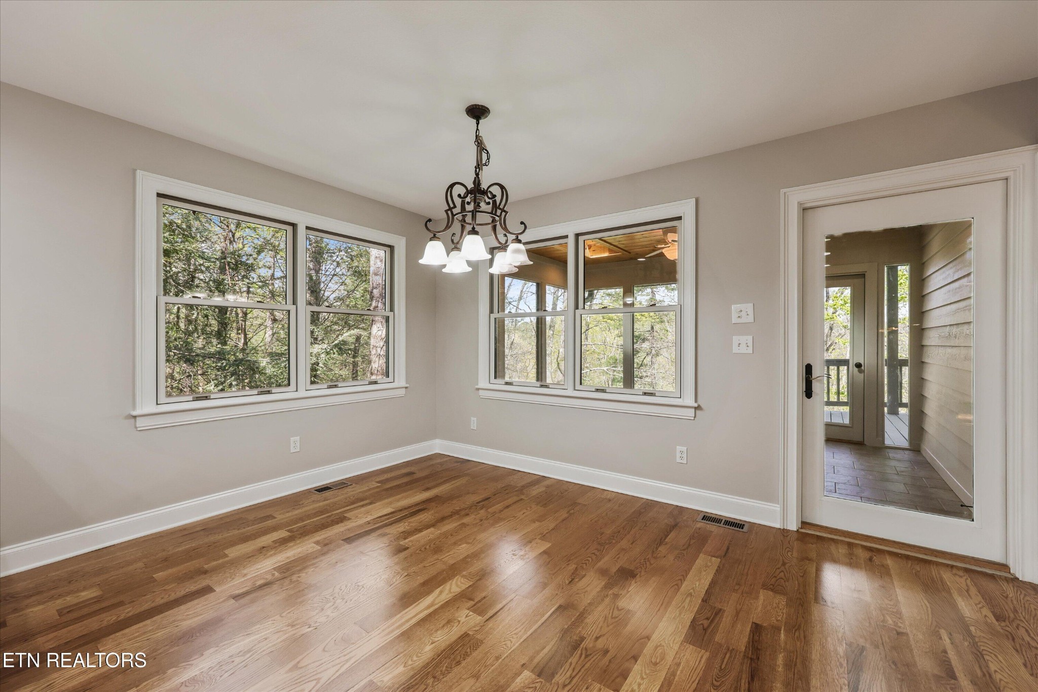 865 Stonegate Way Townsend, TN 37882 - Photo 23 of 60 a view of livingroom with window and hardwood floor
