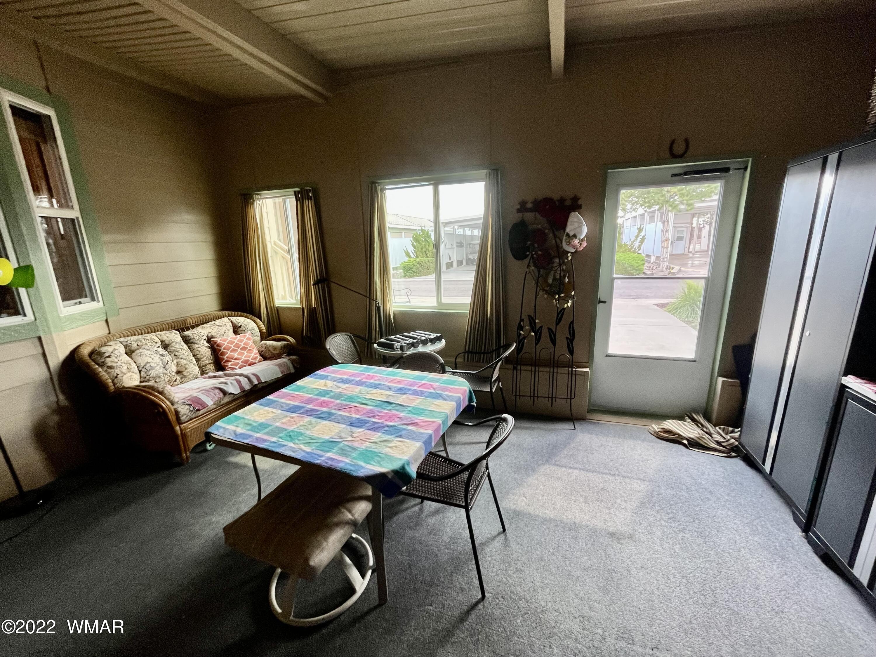 1860 Reel Way, Unit 471 Show Low, AZ 85901 - Photo 20 of 28 a room with furniture and musical instruments