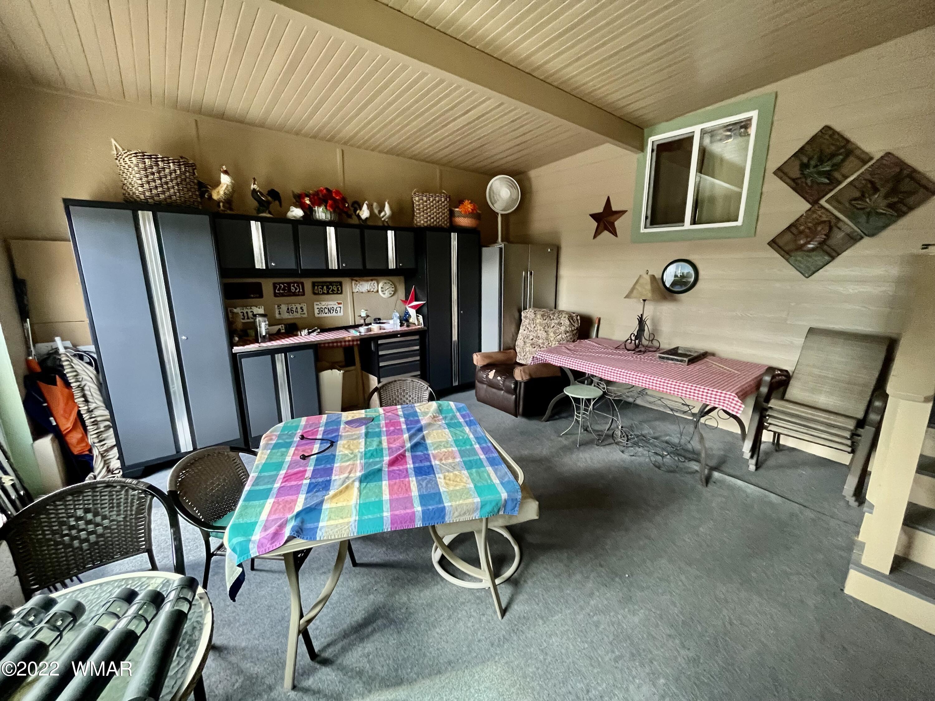 1860 Reel Way, Unit 471 Show Low, AZ 85901 - Photo 21 of 28 a room with musical instruments