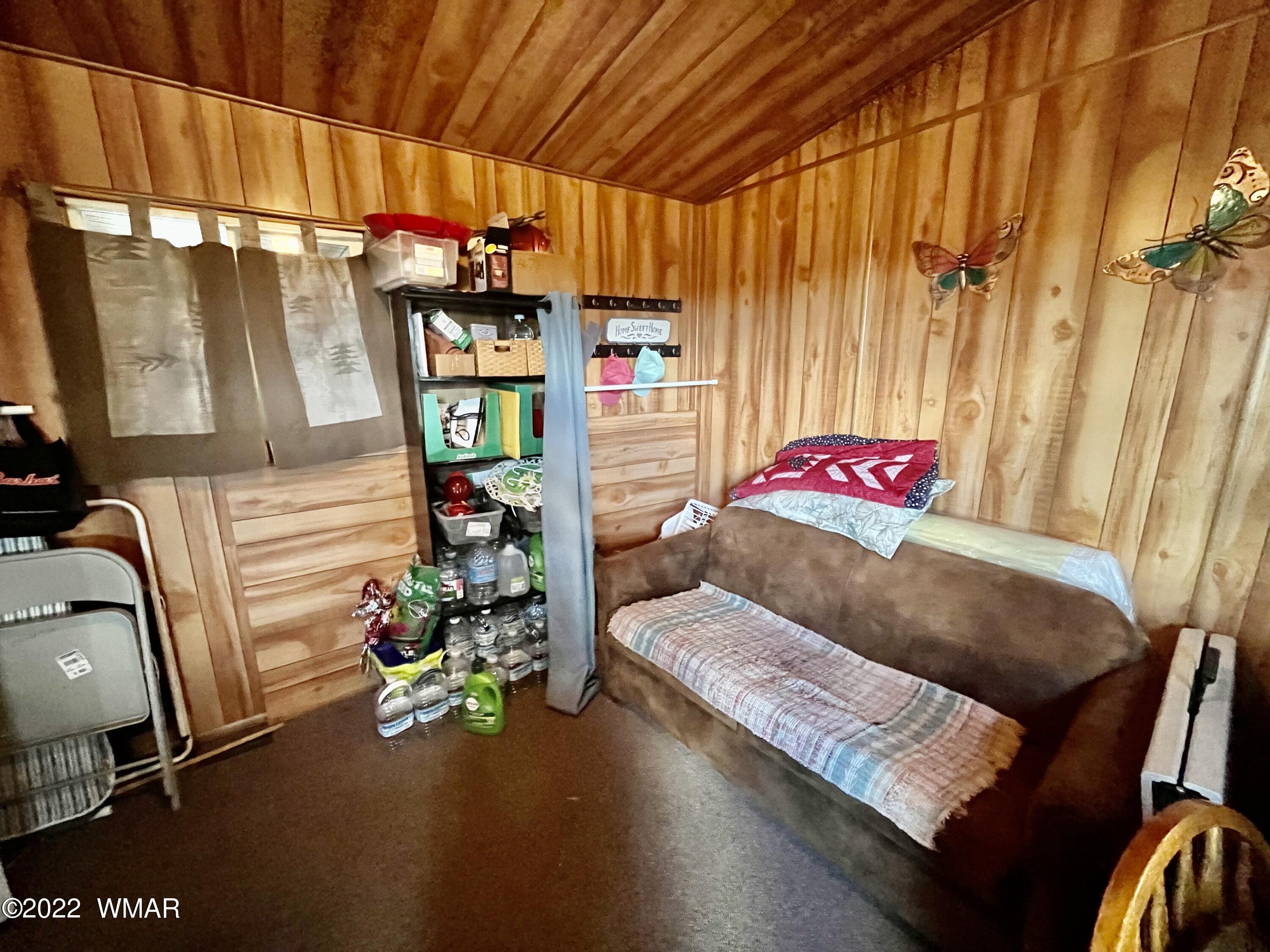 1860 Reel Way, Unit 471 Show Low, AZ 85901 - Photo 23 of 28 a living room with furniture and a couch