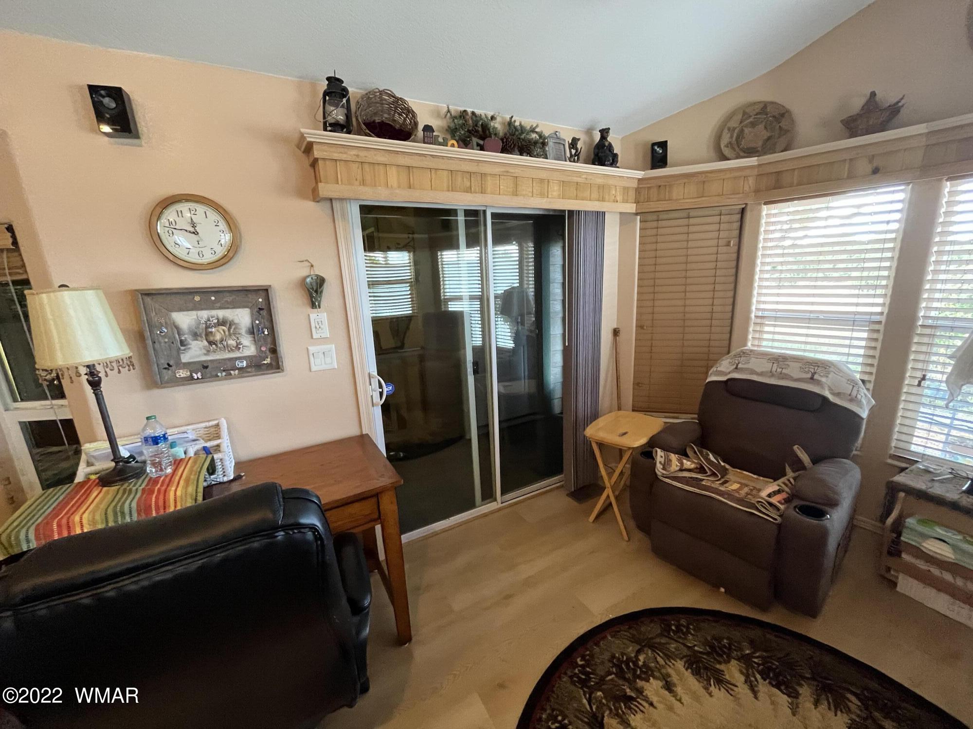 1860 Reel Way, Unit 471 Show Low, AZ 85901 - Photo 7 of 28 a bedroom with furniture and a window