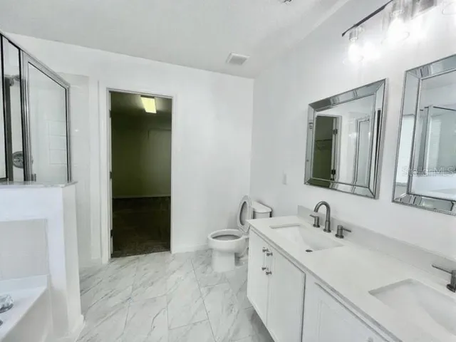 a bathroom with a sink and a toilet