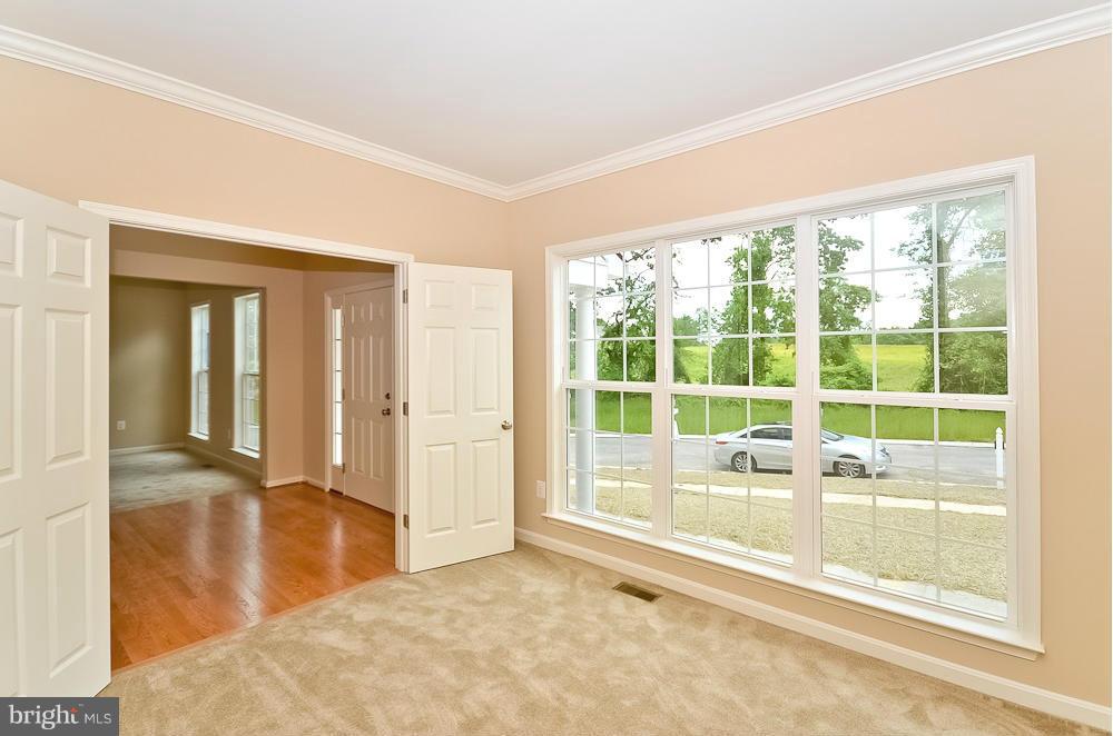 5920 Cypress Springs Road Elkridge, MD 21075 - Photo 14 of 28 a view of an empty room with glass door