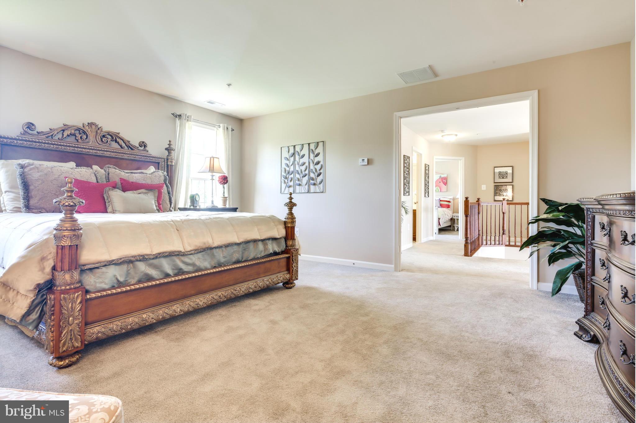 5920 Cypress Springs Road Elkridge, MD 21075 - Photo 17 of 28 a bedroom with a bed and a view of bedroom