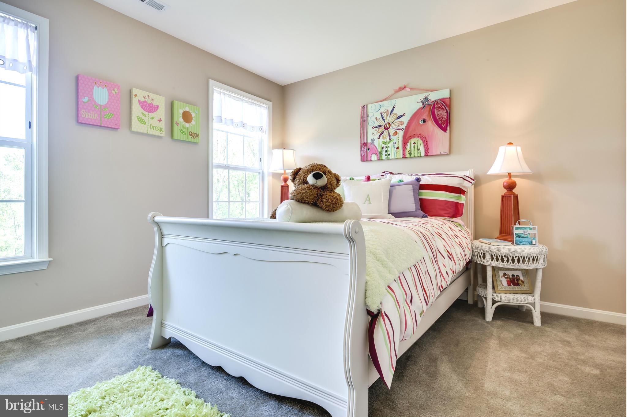 5920 Cypress Springs Road Elkridge, MD 21075 - Photo 23 of 28 a bedroom with a bed and a window